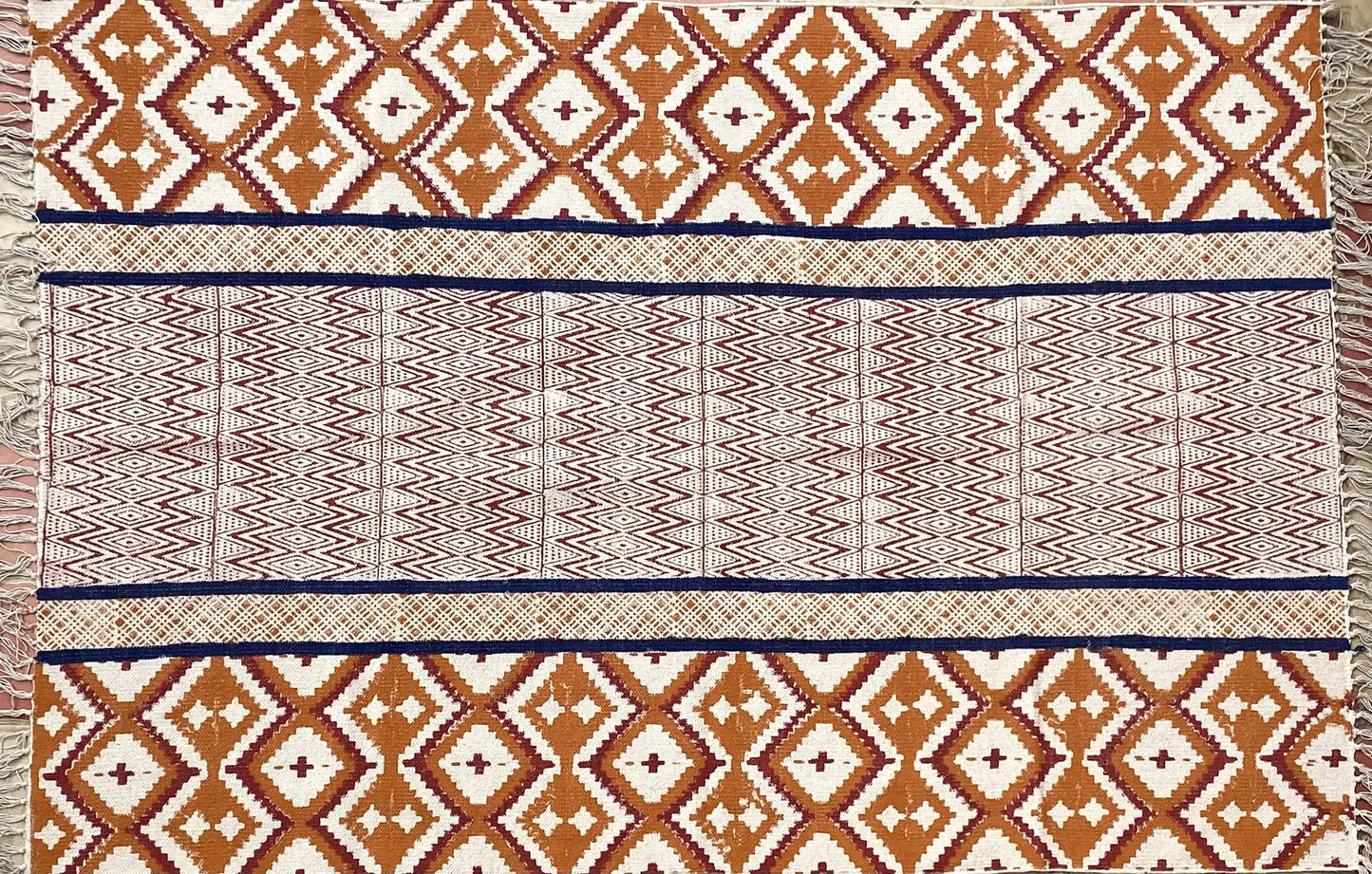 Brown and Red Ikat rug