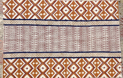 Brown and Red Ikat rug