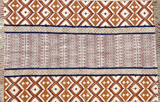 Brown and Red Ikat rug