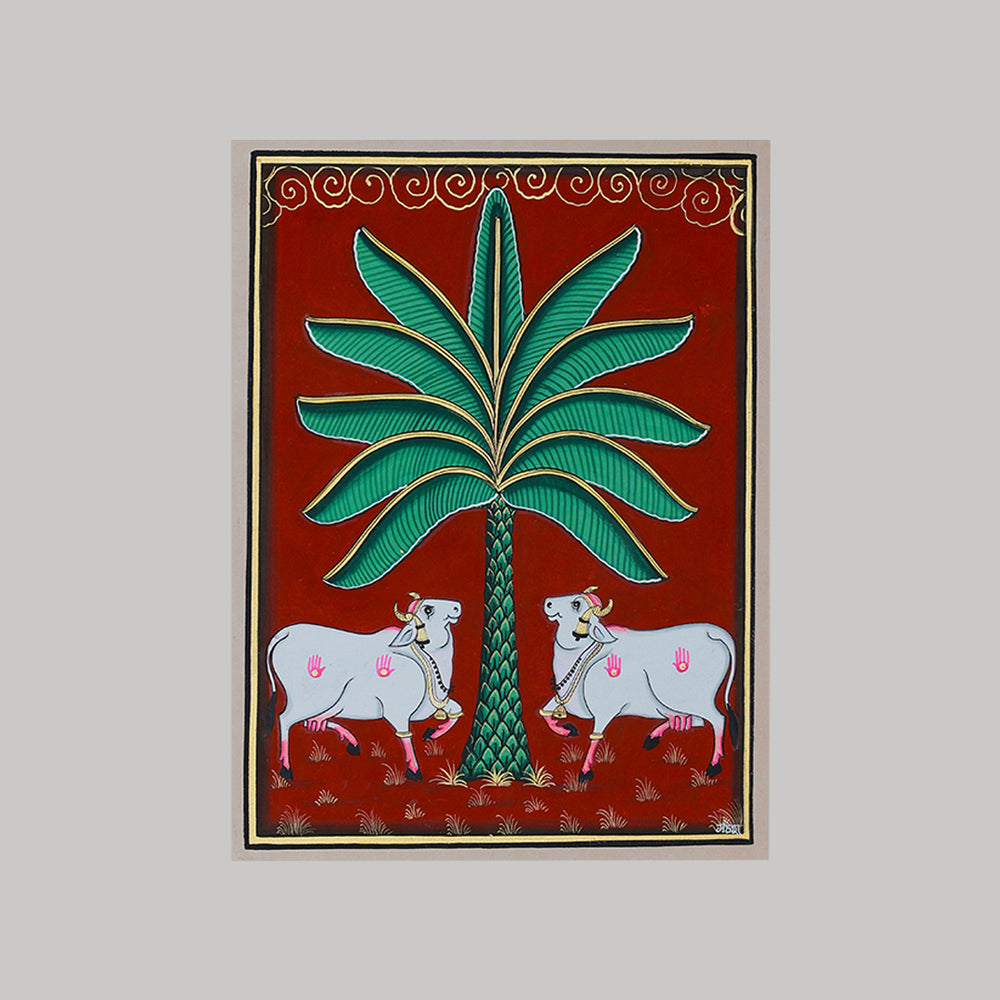 Pichwai painting by Mahesh Vishnoi with two cows and tree maroon background