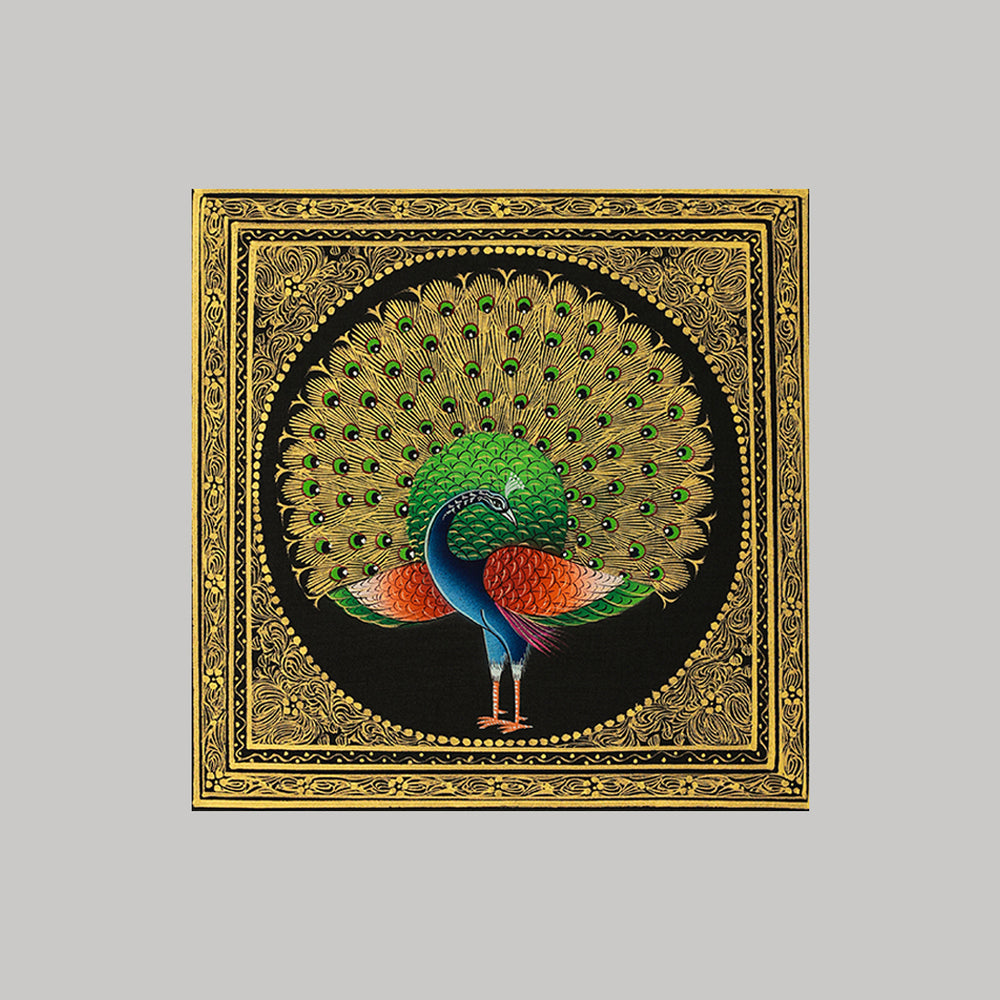 Miniature painting peacock with golden detailing green colour