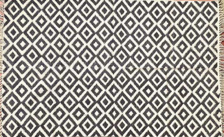 Black ikat cotton rug